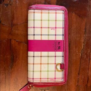 Coach coated zip wallet.